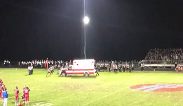 High School Football Team 'Saves" Ambulance — Pushes it off field