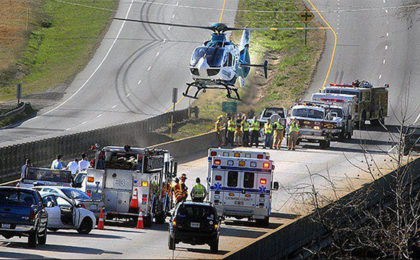 Medical helicopter at accident scene with EMS & Flight Safety Net Team