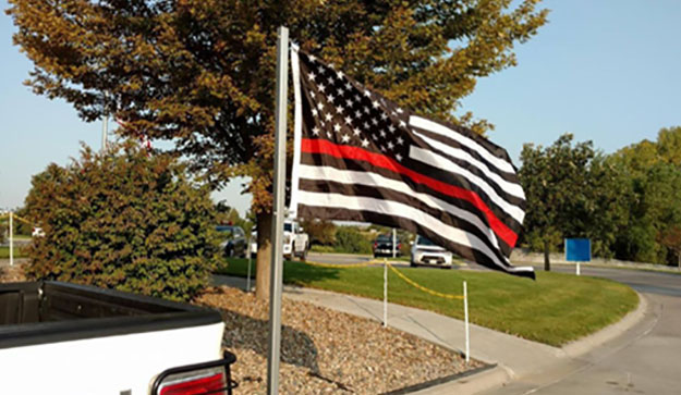 Hospital Orders Firefighter to Remove 911 Memorial Flag from His Truck